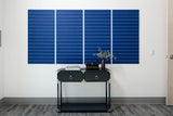 Modern interior with a black console table against a white wall with blue abstract art.