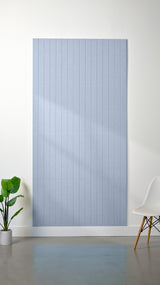 Light blue felt sheet with evenly spaced vertical engraved lines arranged in parallel pattern.