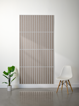 Large rectangular felt sheet with evenly spaced parallel vertical line engravings in taupe and cream tones.