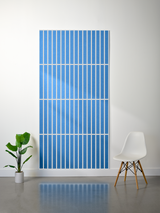 Blue felt sheet with white parallel vertical lines and horizontal dividing sections creating a grid pattern.