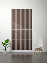 Brown felt sheet with white parallel vertical stripe engraving pattern divided into four sections.