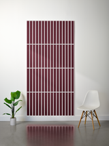 Burgundy felt sheet with parallel vertical line engravings divided into four horizontal sections.