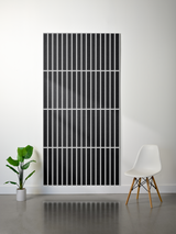 Large black felt sheet with white parallel vertical lines and horizontal dividing sections.