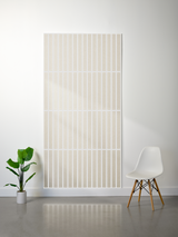 Large cream felt sheet with evenly spaced parallel vertical line engravings dividing surface into rectangular sections.