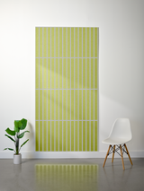 Large chartreuse felt sheet with white parallel vertical lines and horizontal divisions creating a grid pattern.