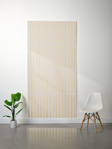 Beige felt sheet with engraved parallel vertical lines and horizontal divisions creating a grid pattern.