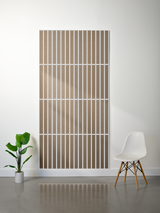Tan felt sheet with white parallel vertical line engravings, divided into four sections.