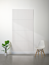 Large rectangular felt sheet with engraved parallel vertical lines creating a layered panel effect.
