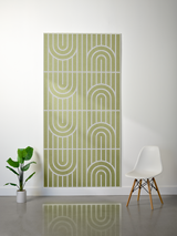 Olive-green felt sheet with engraved geometric arch and vertical line pattern in four repeated sections.