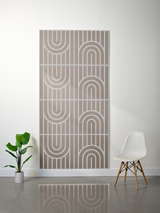 Beige felt sheet with engraved geometric pattern of vertical lines and curved arch shapes arranged in repeating sections.