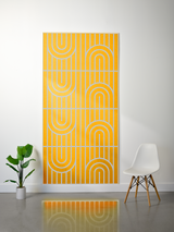Yellow felt sheet with layered engraved pattern of vertical lines and curved arch shapes in cream.