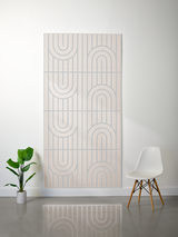 Cream felt sheet with engraved geometric pattern of vertical lines and curved arch shapes arranged in repeating rows.