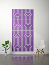Purple felt sheet with engraved geometric arches and vertical line pattern in four repeated sections.