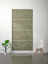 Olive green felt sheet with white engraved geometric arch and line pattern in four repeating sections.