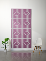 Purple felt sheet with white engraved geometric arches and vertical lines in repeating pattern.