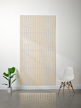 Cream felt sheet with engraved geometric pattern of vertical lines and curved U-shaped motifs arranged in a grid layout.