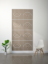 Tan felt sheet with white engraved geometric arch and vertical line pattern in four repeating sections.