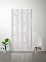 Cream felt sheet with engraved geometric arch and vertical line pattern in four repeating sections.