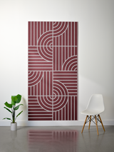 Burgundy felt sheet with white engraved geometric lines forming concentric circles and vertical stripes in a four-quadrant ta