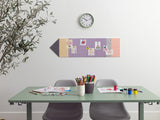 Desk with stationery items, a clock on the wall, and a colorful bulletin board.
