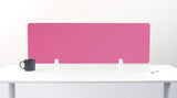 Pink desk divider with chevron quilted pattern and white mounting brackets on white desk.