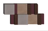 3D arrangement of stacked rectangular blocks in gray, taupe, burgundy, and brown tones.