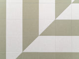 A Felt Right wall art design zoomed in the cream and green tiles.