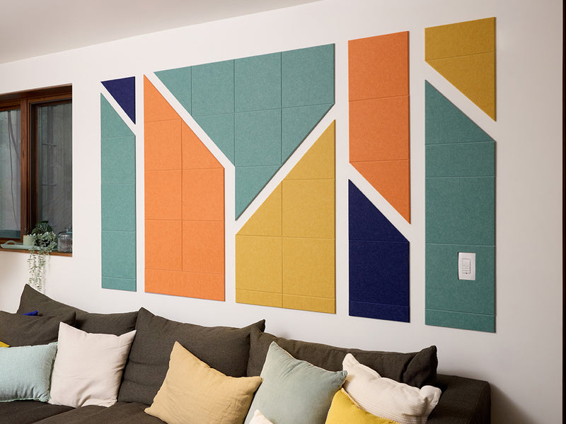 Colorful acoustic wall art above couch
