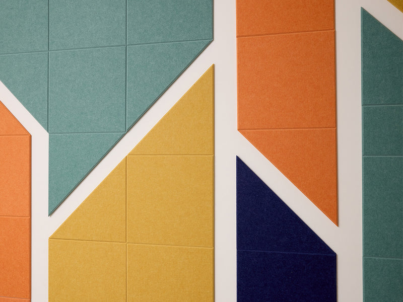 Colorful geometric tile pattern on a wall