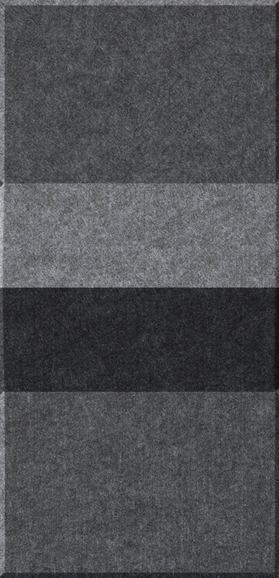Four rectangular tiles in varying shades of gray and black arranged vertically with white dividing lines between them.