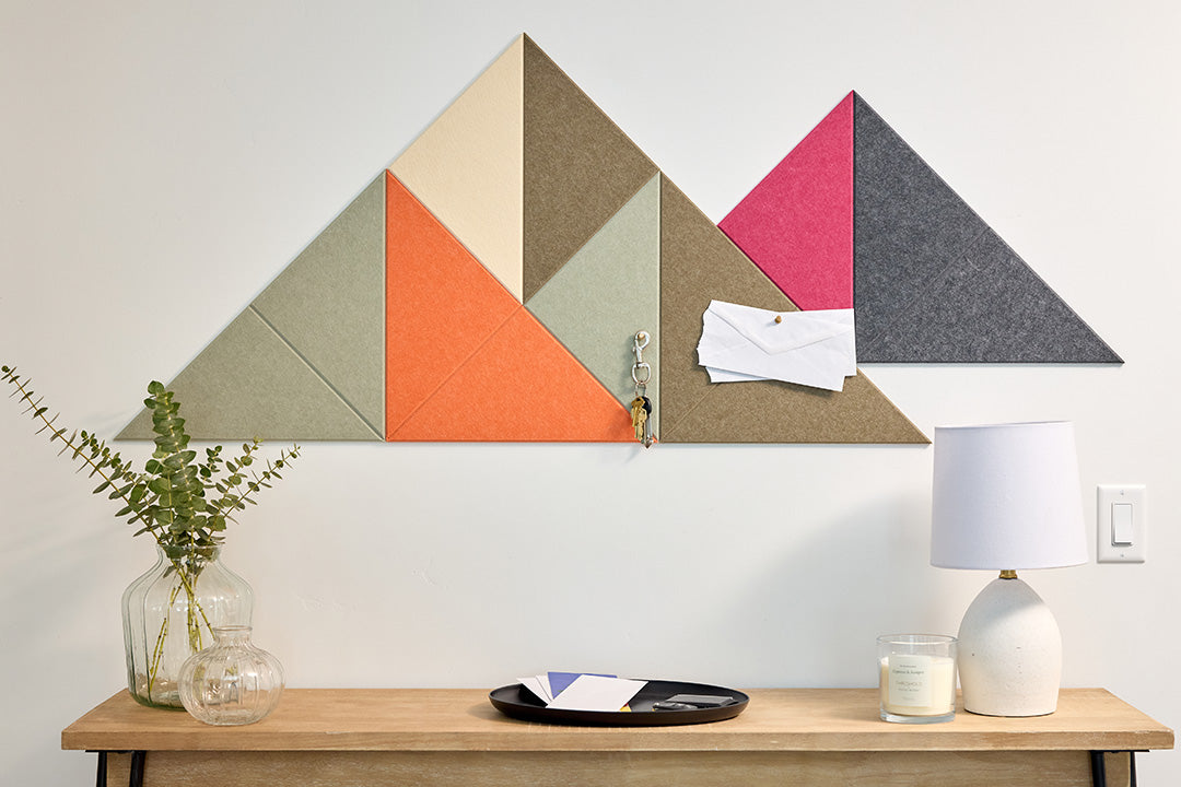 Felt Right Mini Shaded Mountain Design Installed in Entryway Above a Table.