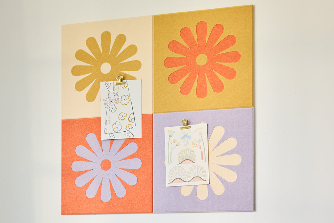 Colorful Flower Tiles Installed on Wall Behind Couch.
