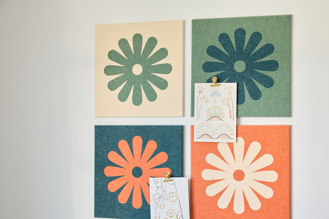 Colorful Flower Tiles Installed on Wall Behind Couch.
