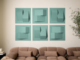Six teal square tiles with dimensional geometric shapes and varying shadow patterns arranged in a grid above a brown sofa.