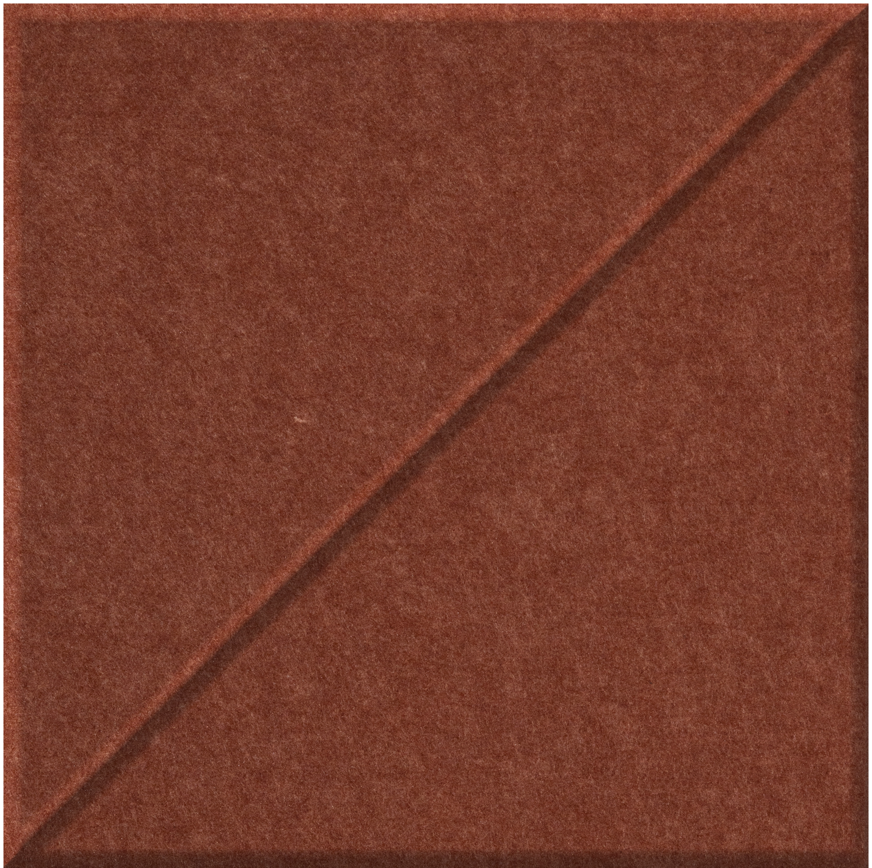 Rust-colored tile with a diagonal slash pattern across the surface.
