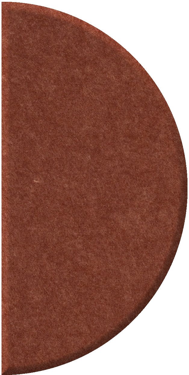 Terracotta half-circle tile with textured surface and curved edges.