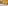 A Felt Right Wall design in a yellow shade in a living room behind a table with two lamps and a couch