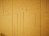 A close up view of a Felt Right Wall design in a yellow shade.
