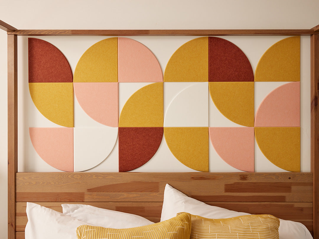 Decorative wall panel with geometric pattern in a bedroom setting