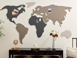 Neutral world map wall art in entryway