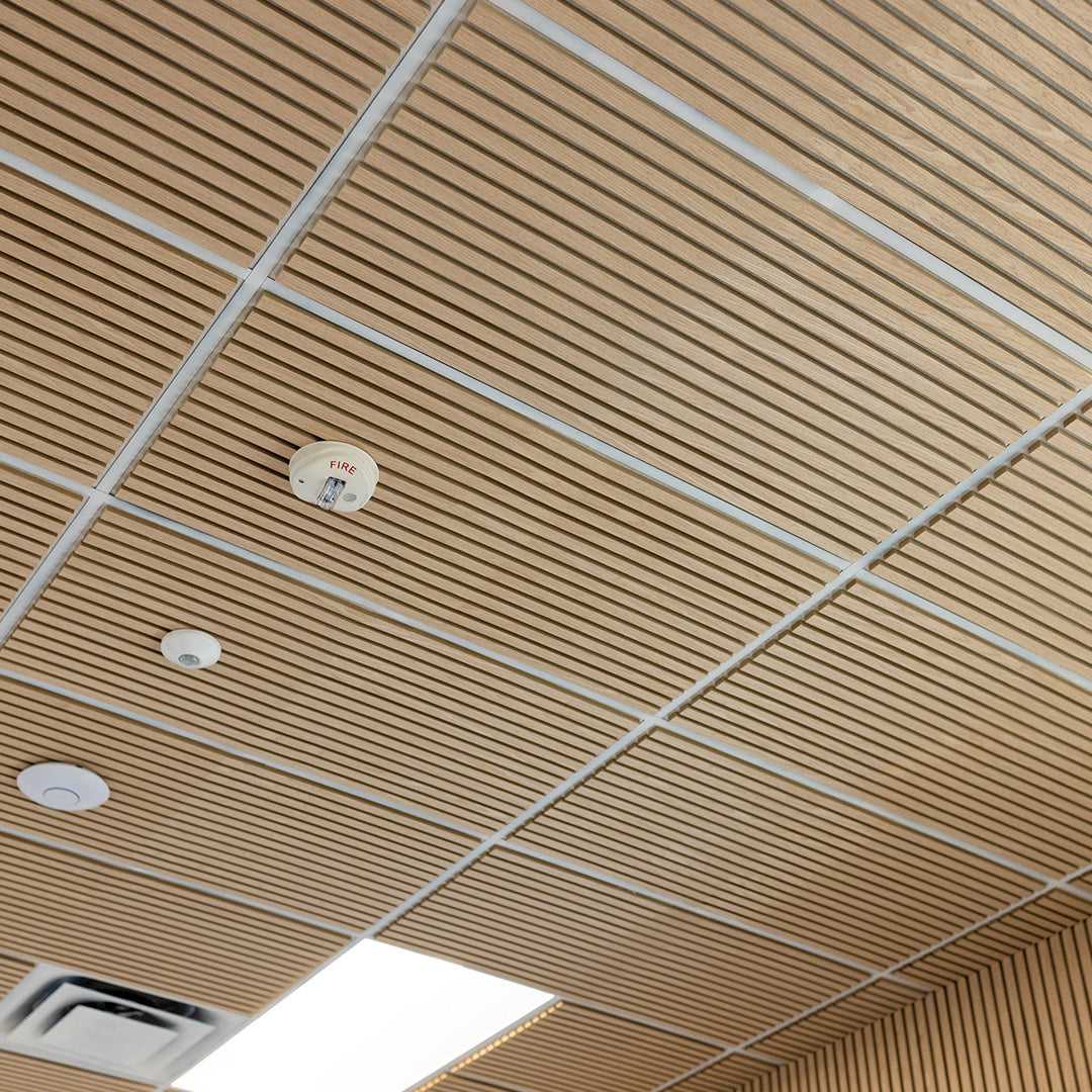 Ceiling with wooden paneling and light fixtures