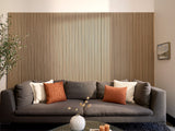 Oak wood slat wall panel with evenly spaced vertical slats in natural light wood tone.