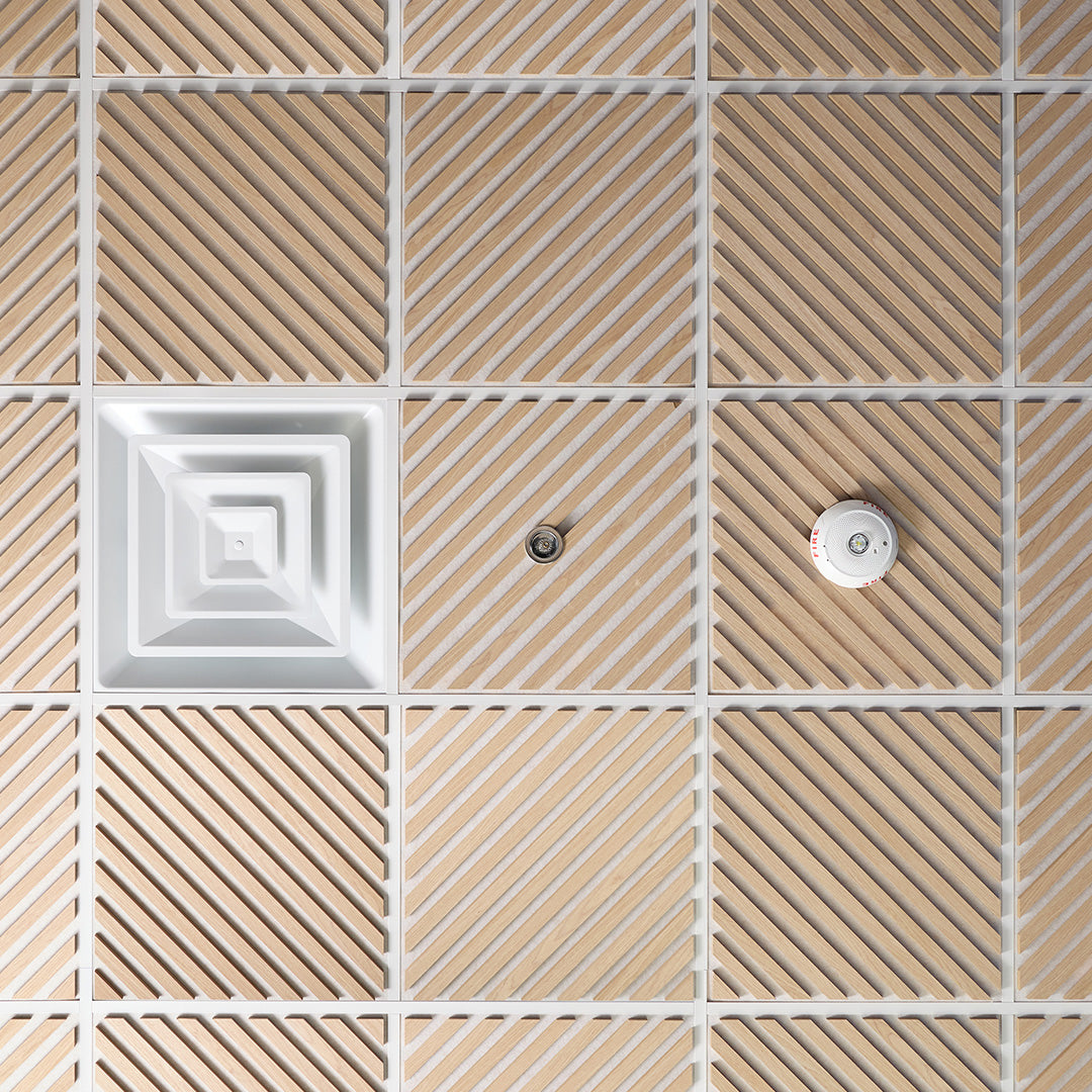 Close-up of a tiled wall with geometric patterns