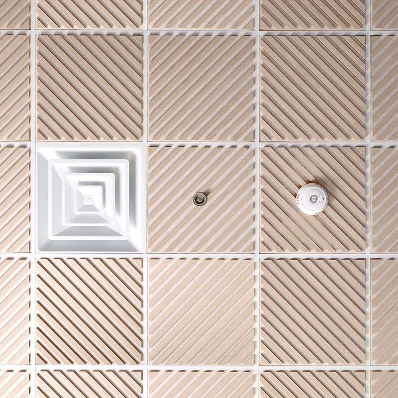 Close-up of a tiled wall with geometric patterns