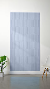 Light blue felt sheet with engraved linear pattern in offset brick layout.