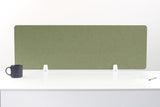 Green fabric desk divider with white mounting brackets on white desk surface.