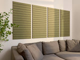 Four olive-green horizontal stripe wall panels mounted above a gray sectional sofa with green foliage visible on left side.