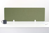 Sage green desk divider with geometric arc pattern and white metal supports on white surface.