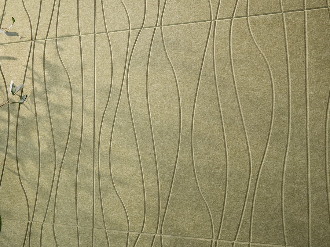 Textured green surface with wavy patterns