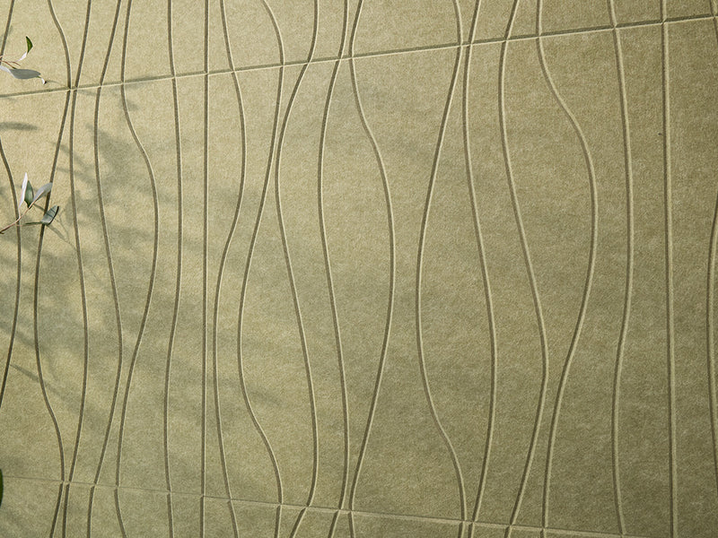 Textured green surface with wavy patterns